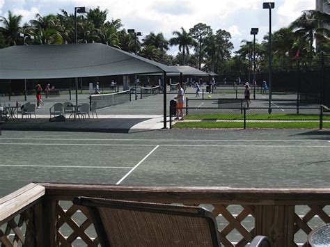 Use a drag mat if the court has excess leaves,. Tarpon Cove Club Tennis Courts in Wiggins Bay area of ...