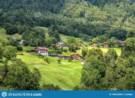Landscape Of Alpine Mountains Small Village In Switzerland Scenery Of