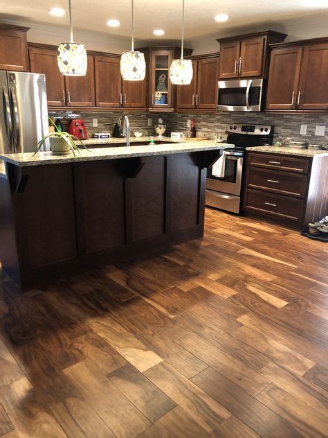 I really like the acacia haze color but wondering if it would transition well with the mindful gray that i am planning on. Acacia hardwood really sets off this kitchen | Kitchen ...