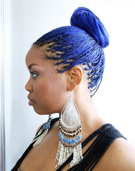 Blue Braidspulled Back Into A Ponytail With Beautiful Earrings Box