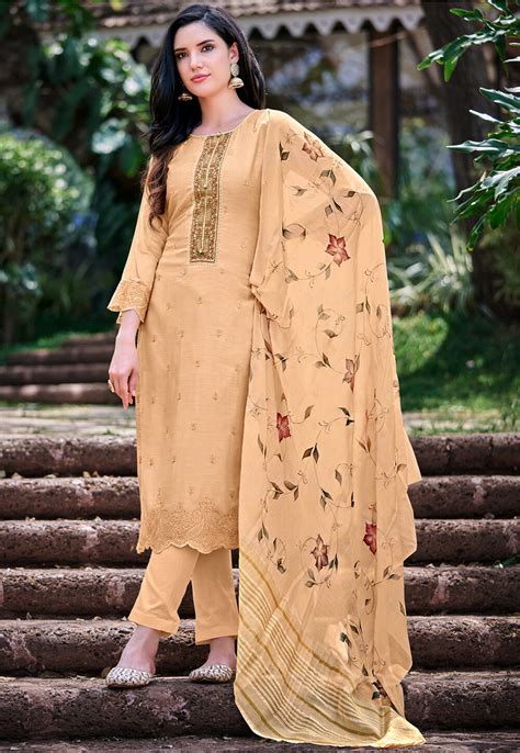 Embroidered Art Muslin Silk Pakistani Suit In Light Mustard Kjr657