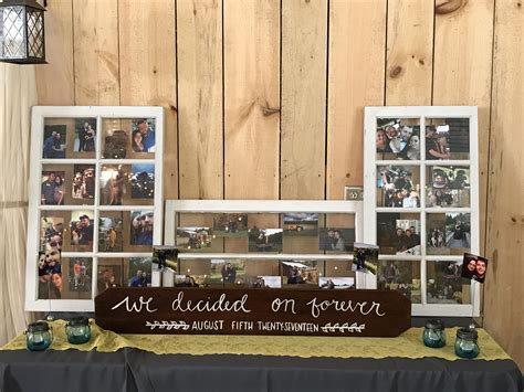 Creating a gallery wall with photos. Beautiful display of photos of the couple | Rustic wedding, Photo, Photo wall