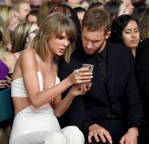 Taylor Swift Calvin Harris Share A Hug And Kiss At Billboard Awards