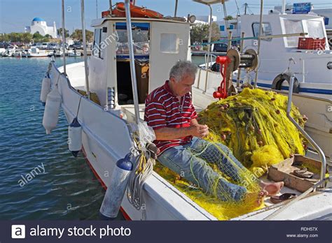 Fishing Port Men Mending Nets Hi Res Stock Photography And Images Alamy