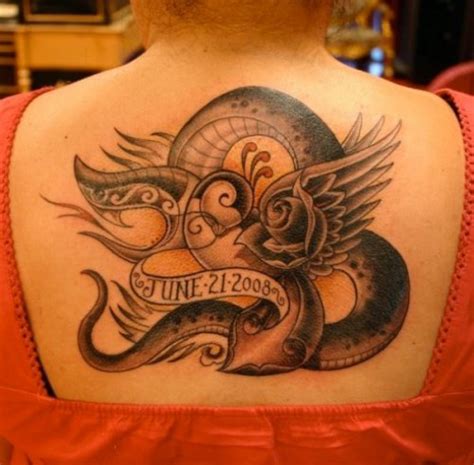 He began tattooing at the age of 15. Snake tattoo by Corey Miller - | TattooMagz › Tattoo ...