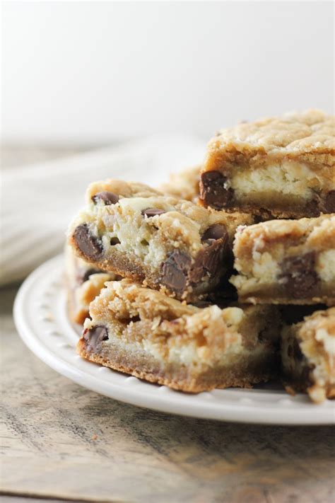 It's no chill, mixed by hand, and they turn out soft on the inside and crisp on the outside. The BEST Chocolate Chip Cookie Cheesecake Bars | Baked in AZ
