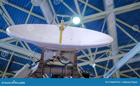 White Rotating Satellite Dish Antenna Using To Receive Or Transmit