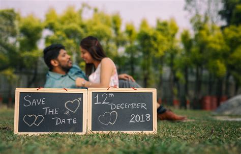 A Couple With Save The Date Board Pixahive