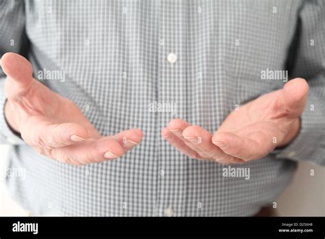 A Man Gestures With Both Hands Stock Photo Alamy