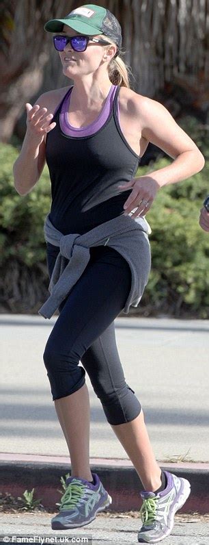 reese witherspoon dons form fitting workout gear as she goes jogging daily mail online