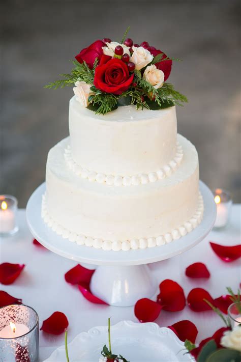 The Two Tiered Wedding Cake Was Beaded At The Bottom Of Each Tier And