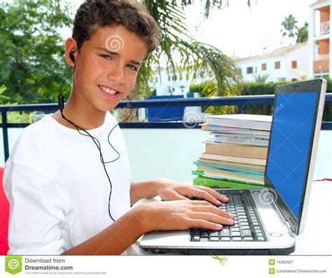 Teenager Student Happy Boy Laptop Earphones Royalty Free Stock Photography - Image: 16382627