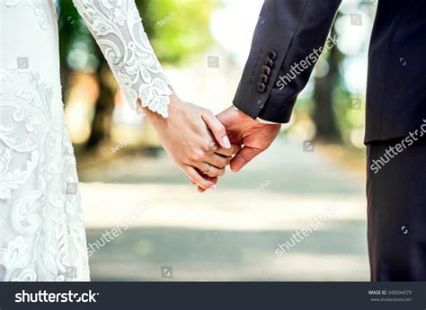Closeup View Married Couple Holding Hands Stock Photo 340594079