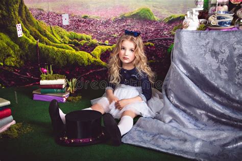 Little Sitting Floor Girl As Alice Wonderland Stock Photos Free