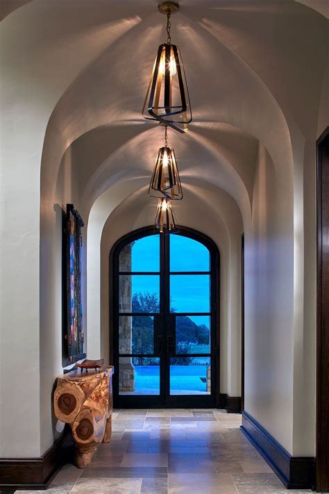 A barrel vault is the simplest type of ceiling vault, and a groin vault is the result of two intersecting barrels. Groin vault ceiling with open-shade light fixtures and ...