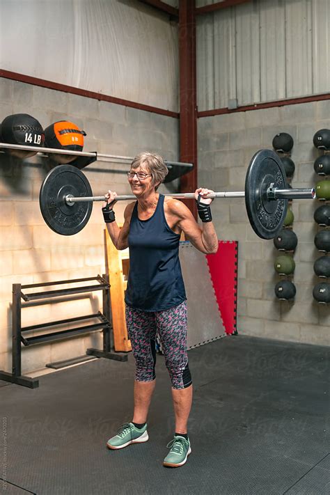 Senior Woman At Gym By Stocksy Contributor RZCREATIVE Stocksy