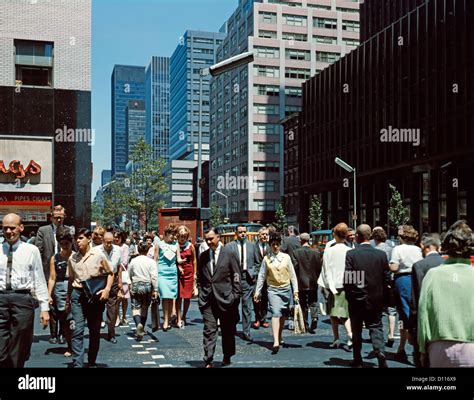 1960s Pedestrians Crossing New York City Street Corner Of 42nd Street