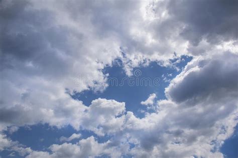 Cumulus Humilis Clouds In The Blue Sky View From Below Stock Image