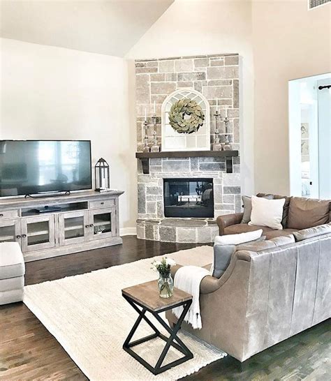We sectioned the large space into distinct areas, which is a great way to maximize square footage if you have limited rooms in the house. #smalllivingroom furniture layout with corner fireplace ...