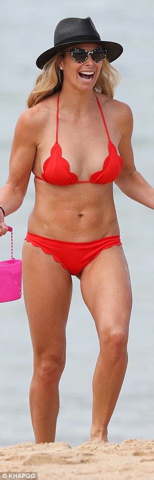 Candice Warner Flaunts Her Toned Physique In A Tiny Bikini At The Beach