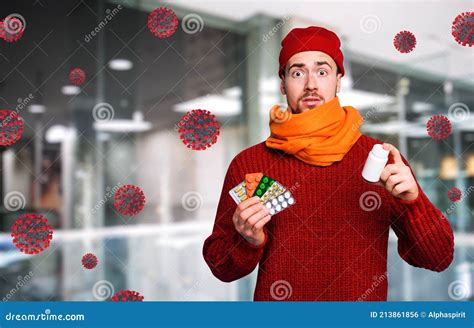 Boy Caught A Cold And Uses Pills To Heal Studio On Cyan Background
