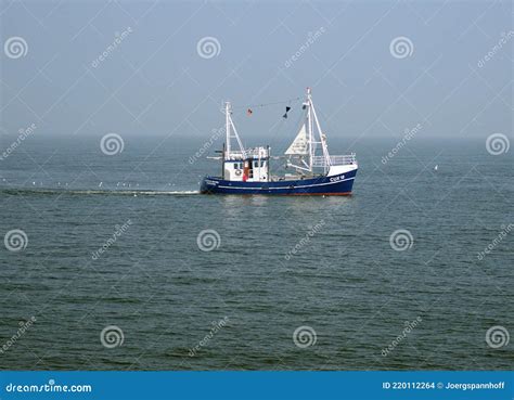 Small Blue Fish Trawler Fishing In The North Sea Editorial Stock Image
