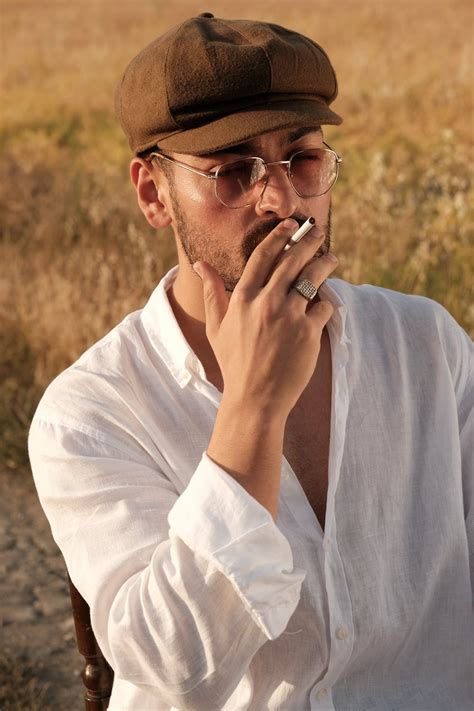 Portrait Of Man Smoking Cigarette · Free Stock Photo