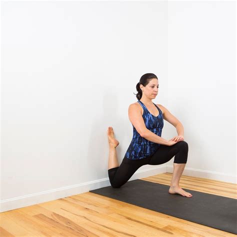 Kneeling Hip Flexor Stretch Against A Wall Stretching Exercises For