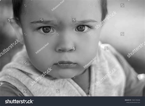 Serious Baby Sad Baby Closeup Look Stock Photo Edit Now 1583135668