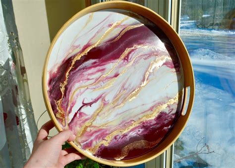 The two parts are mixed, then poured into the tray which then sets hard. Reddit - crafts - Resin pour on a tray | Diy resin art ...