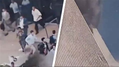 Harrowing 911 Footage Shows Moment People Fled From World Trade Center