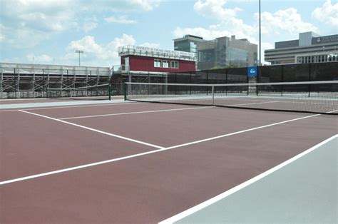 The actual tennis court is situated in a wooden hall with a honeycomb style arch roof. University of Chicago (IL) - Division III Tennis