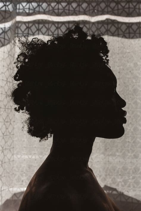 Silhouette Of A Young Black Woman Del Colaborador De Stocksy Chelsea