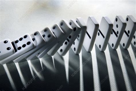 Falling Dominoes Stock Image C0019947 Science Photo Library