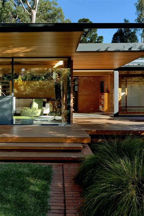Midcentury Glass House Meets Modern Simplicity Mid Century Home In 2021 Glass House Glass