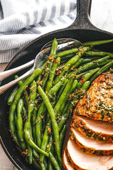 Pork tenderloin is lean and has almost no fat. Roasted Pork Loin with Green Beans | Pork loin side dishes, Pork recipes, Cooking green beans