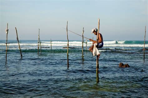 Sri Lankan Traditional Fisherman On Stick In The Indian Ocean Editorial