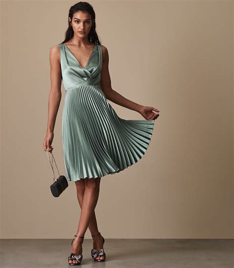 The Sophisticated Alicia Green Pleat Dress From Reiss Features A V