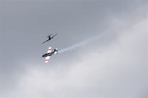 Yak 52 Aircraft In The Sky Performs The Program At The Air Show