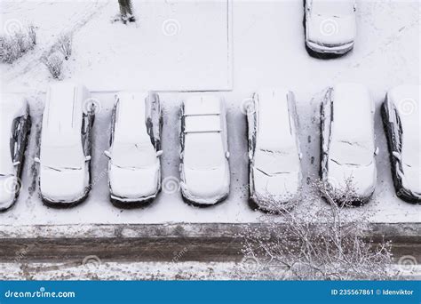 Cars Covered Snow On A Parking After Blizzard Snowfall First Snow