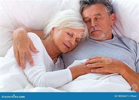 Senior Couple Sleeping In Bed Stock Image Image Of Casual Affection