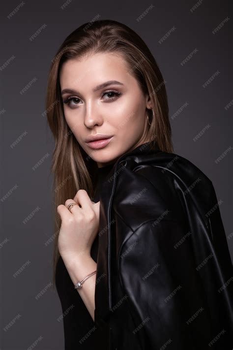 Premium Photo Sexy Young Girl With A Perfect Body In Black Leather