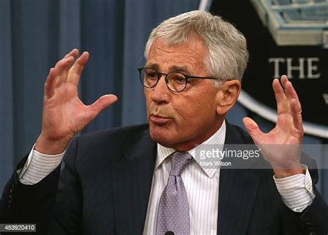 Chuck Hagel Holds Press Briefing At The Pentagon Photos And Premium
