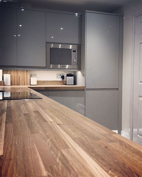 Cabinet options can customise the kitchen like a bank of two drawer cabinets which maximise storage. Finally, our new kitchen! Gloss Grey handleless ...