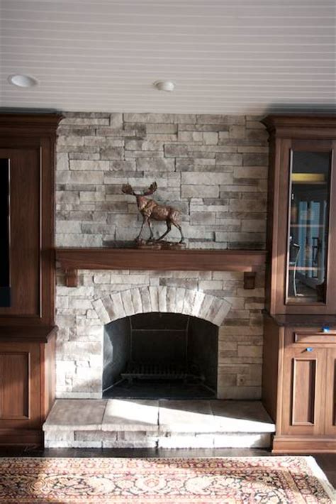 Just the addition of a faux mantel—no flame required—can make a space cozier. Ledgestone Fireplace Pictures - North Star Stone