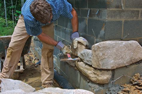 How To Install Stone Veneer Over A Concrete Wall Fine Homebuilding