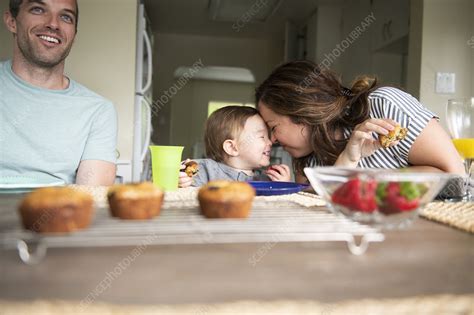 Happy Mother And Babe Rubbing Noses At Kitchen Table Stock Image F Science