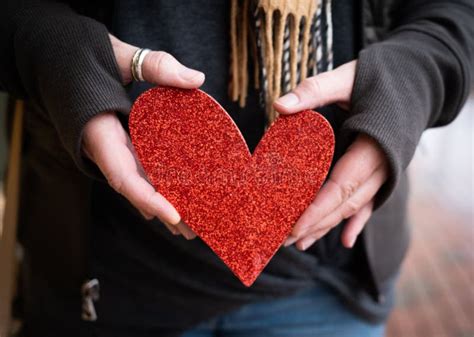 Red Paper Heart Being Held In A Woman S Hands Stock Image Image Of