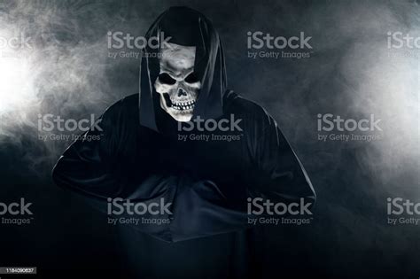 Grim Reaper Ghost Coming Out Of The Foggy Mist Stock Photo Download