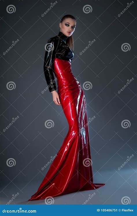 beautiful brunette woman in red and black latex dress stock image image of clothes